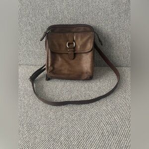 Fossil Brown Crossbody Bag with Adjustable Strap and Timeless Design